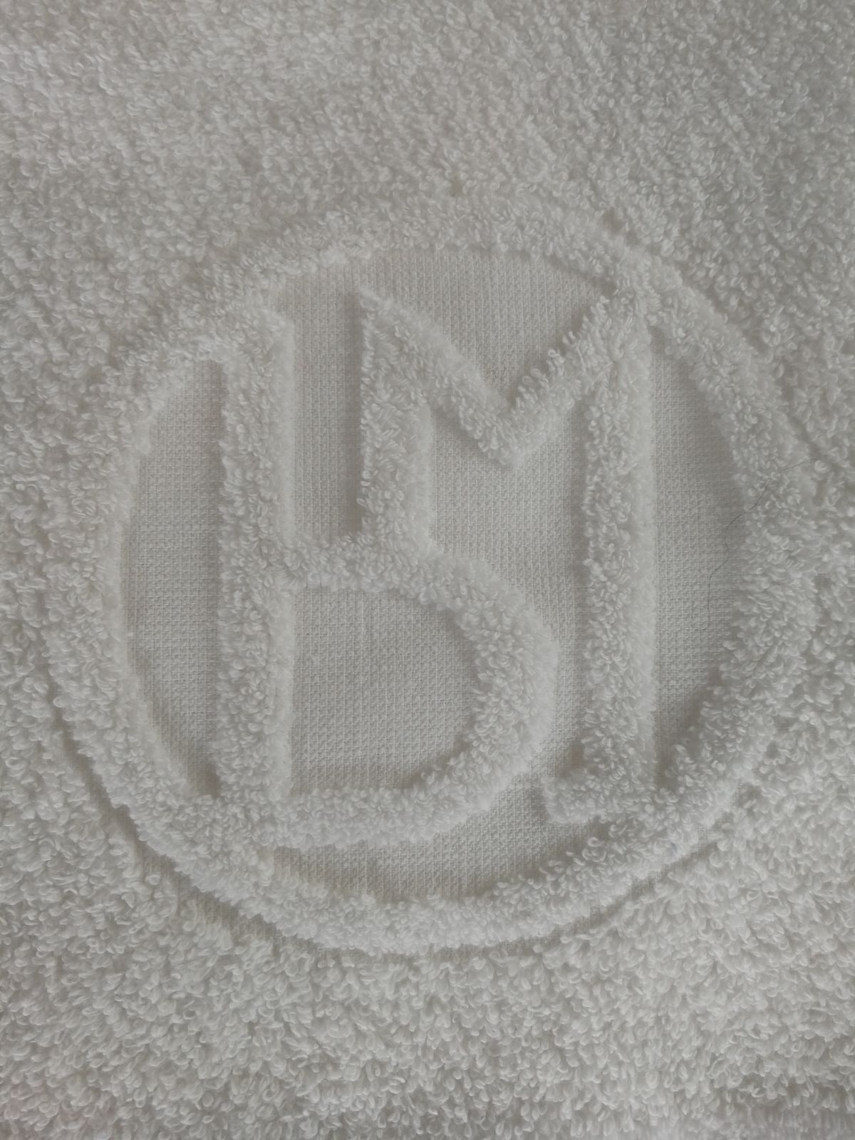 Logo brodé éponge